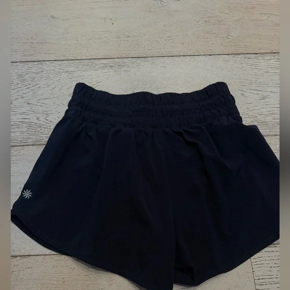 Pristine excellent Athleta Girl Run Free 3 inch Shorts- Navy Size L (12) - Picture 2 of 4